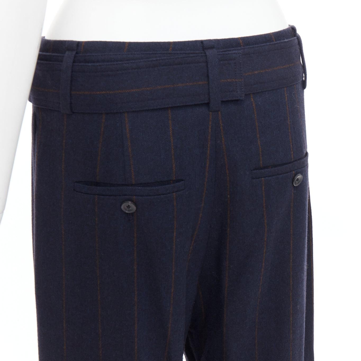 VINCE navy brown wool blend pinstripe belted wide leg trousers US6 M
Reference: KNLM/A00347
Brand: Vince
Material: Wool, Blend
Color: Navy, Brown
Pattern: Pinstriped
Closure: Belt
Made in: China

CONDITION:
Condition: Excellent, this item was