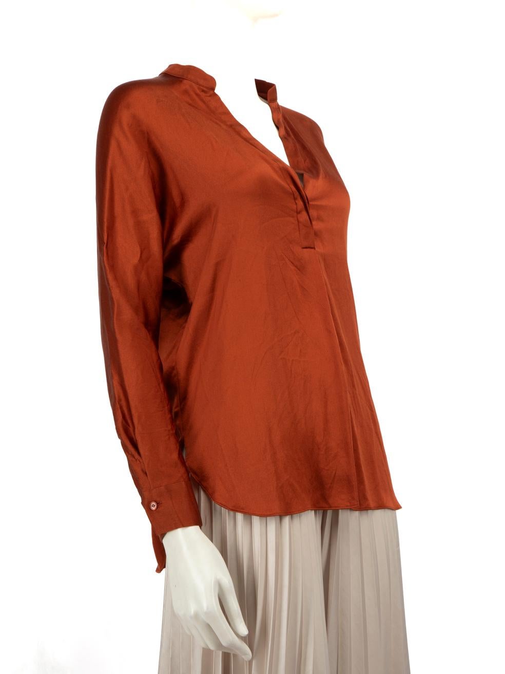 CONDITION is Very good. Hardly any visible wear to top is evident on this used Vince designer resale item.
  
  Details
  
  
  Orange 
  
  Silk 
  
  Blouse
  
  Long sleeves
  
  Loose-fit
  
  V neck
  
  Buttoned sleeve cuffs
  
  
  
  Made in