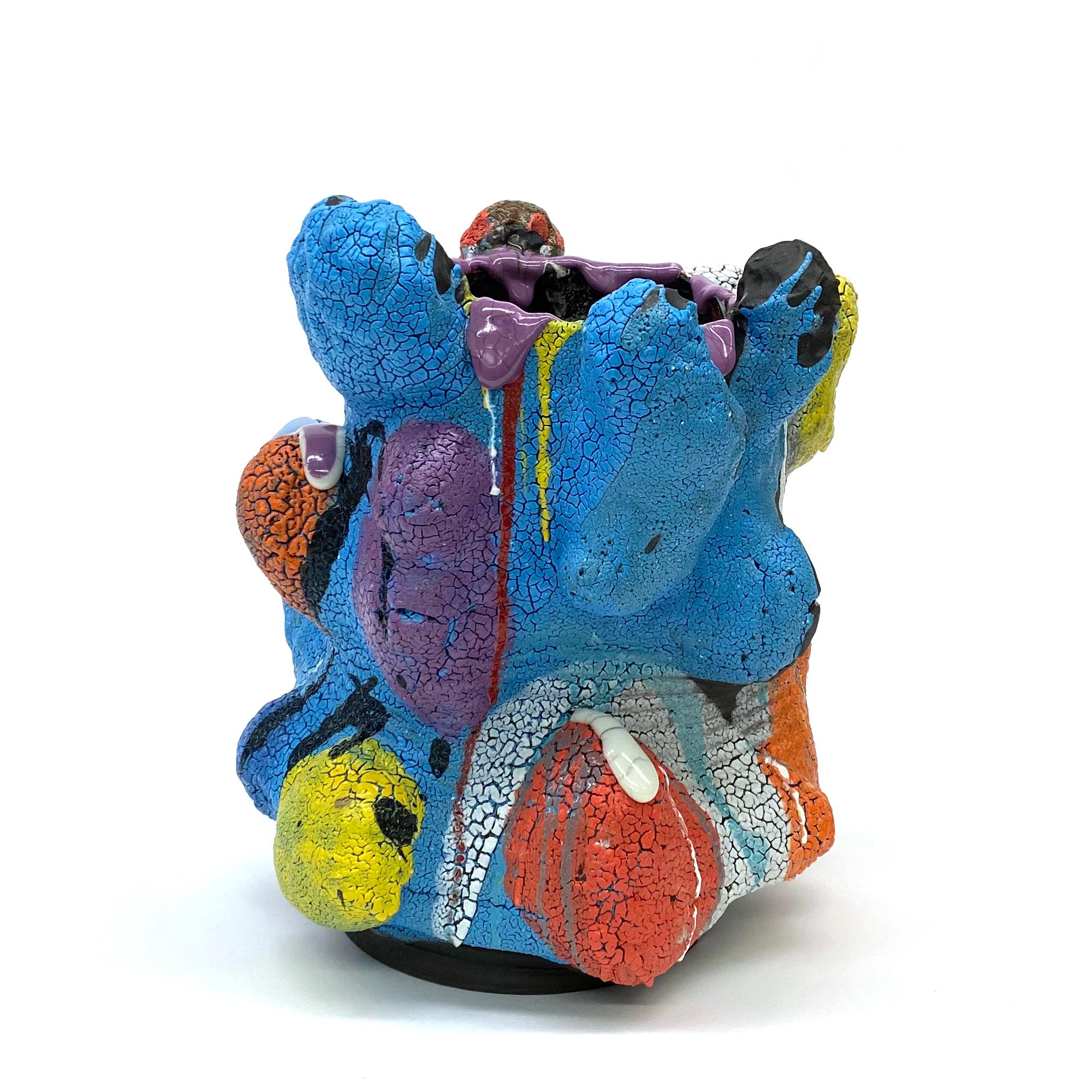 	Vince Palacios (b.1961, Flint, Michigan) has been working in the fields of ceramics since 1992 and currently serves as Professor of the Ceramics Department at El Camino College in Torrance, California. Literally overflowing with bright colors and