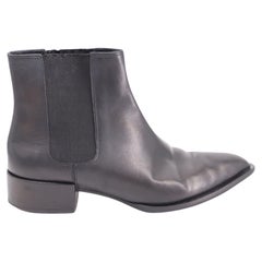 Bottines à talon bas et bout pointu Vince, en cuir noir