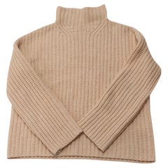 Vince-Rollkragenpullover mit Rippmuster aus Wolle in Pfirsich