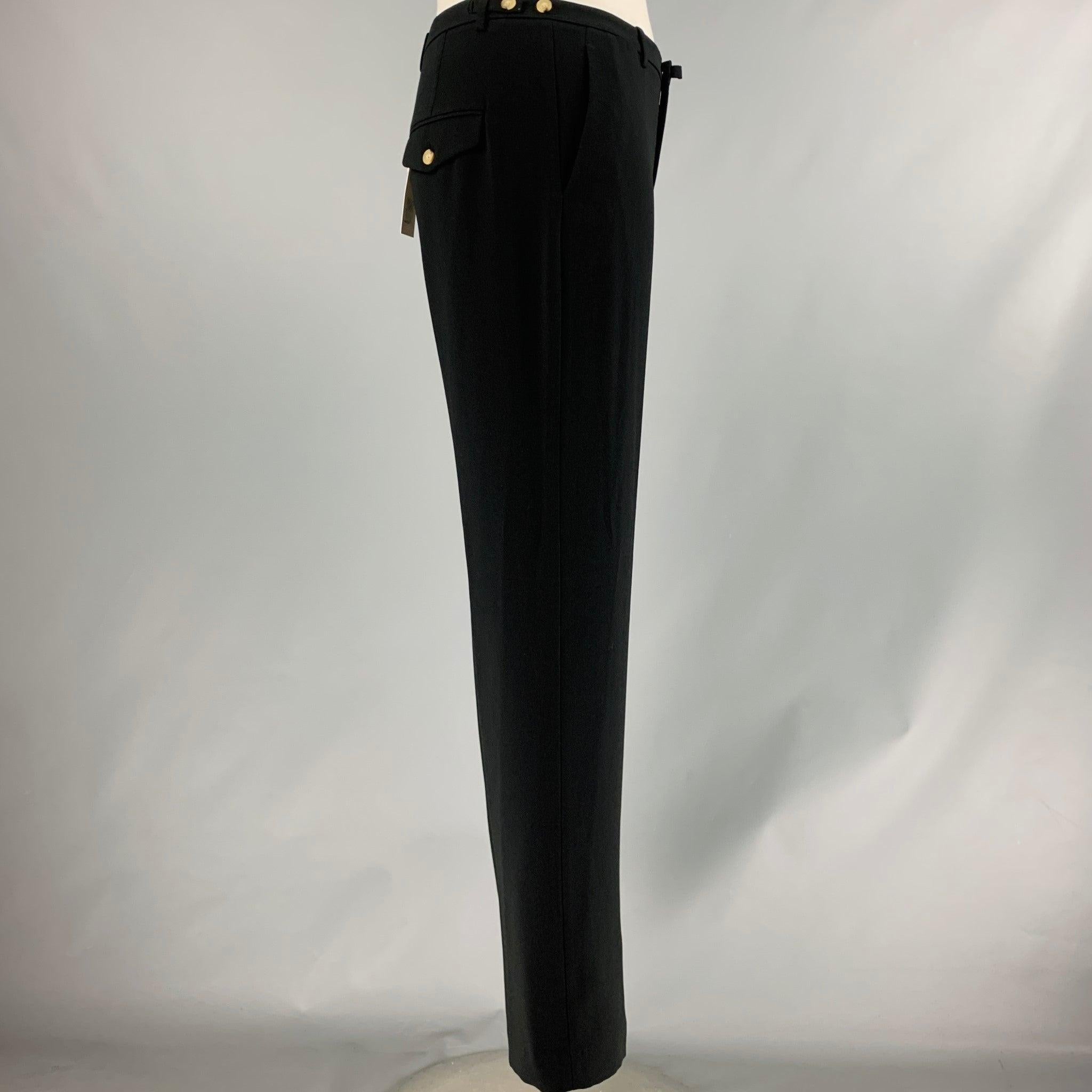 VINCE dress pants
in a black triacetate blend fabric featuring side tabs, and zip fly closure.New with Tags. 

Marked:   12 

Measurements: 
  Waist: 33 inches Rise: 11.5 inches Inseam: 32 inches 
  
  
 
Reference No.: 128357
Category: Dress