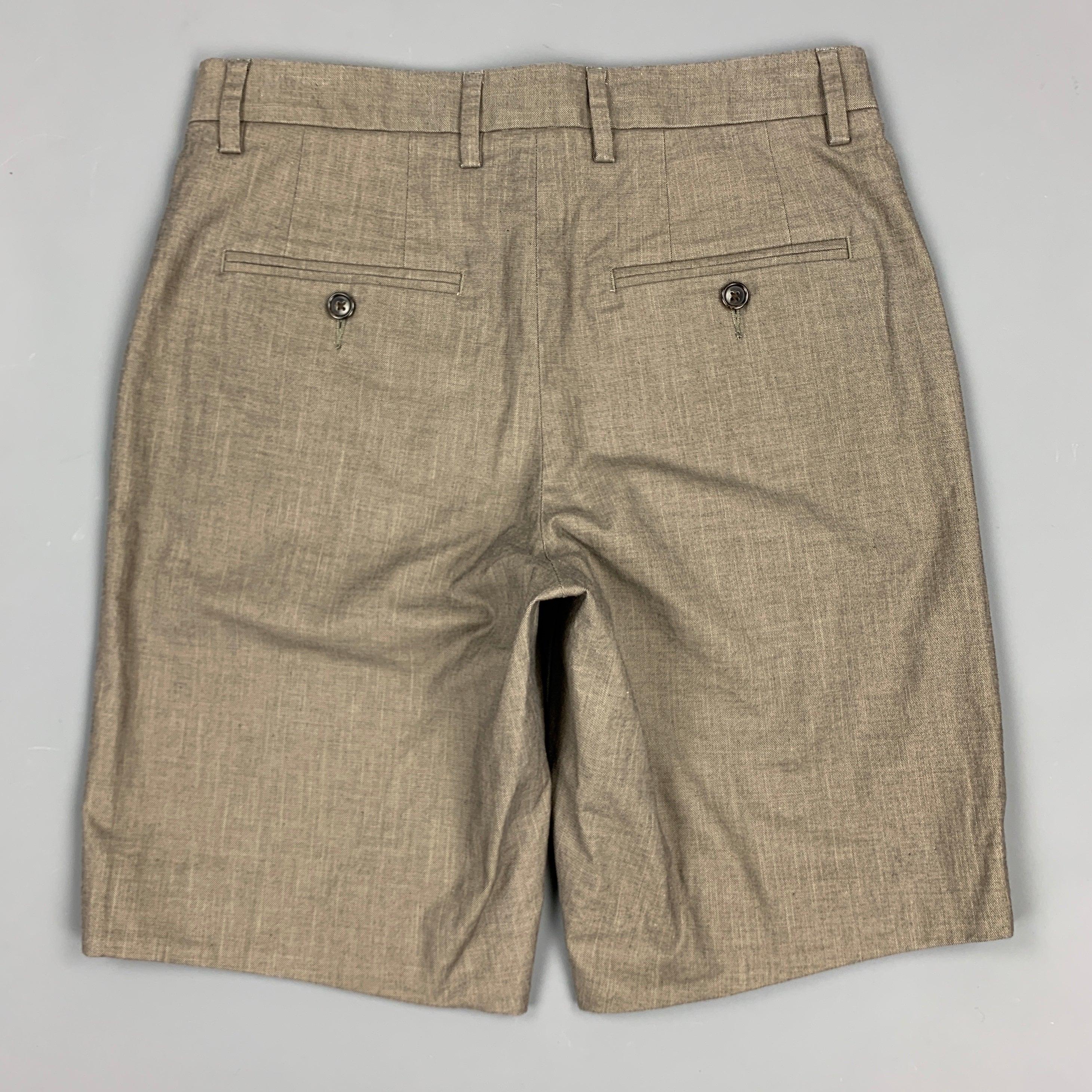 VINCE shorts comes in a slate cotton featuring a zip fly closure.New With Tags. 

Marked:   28 

Measurements: 
  Waist: 30 inches 
Rise: 10 inches 
Inseam: 8.5 inches 
  
  
 
Reference: 83752
Category: Shorts
More Details
    
Brand:  VINCE
Size: 