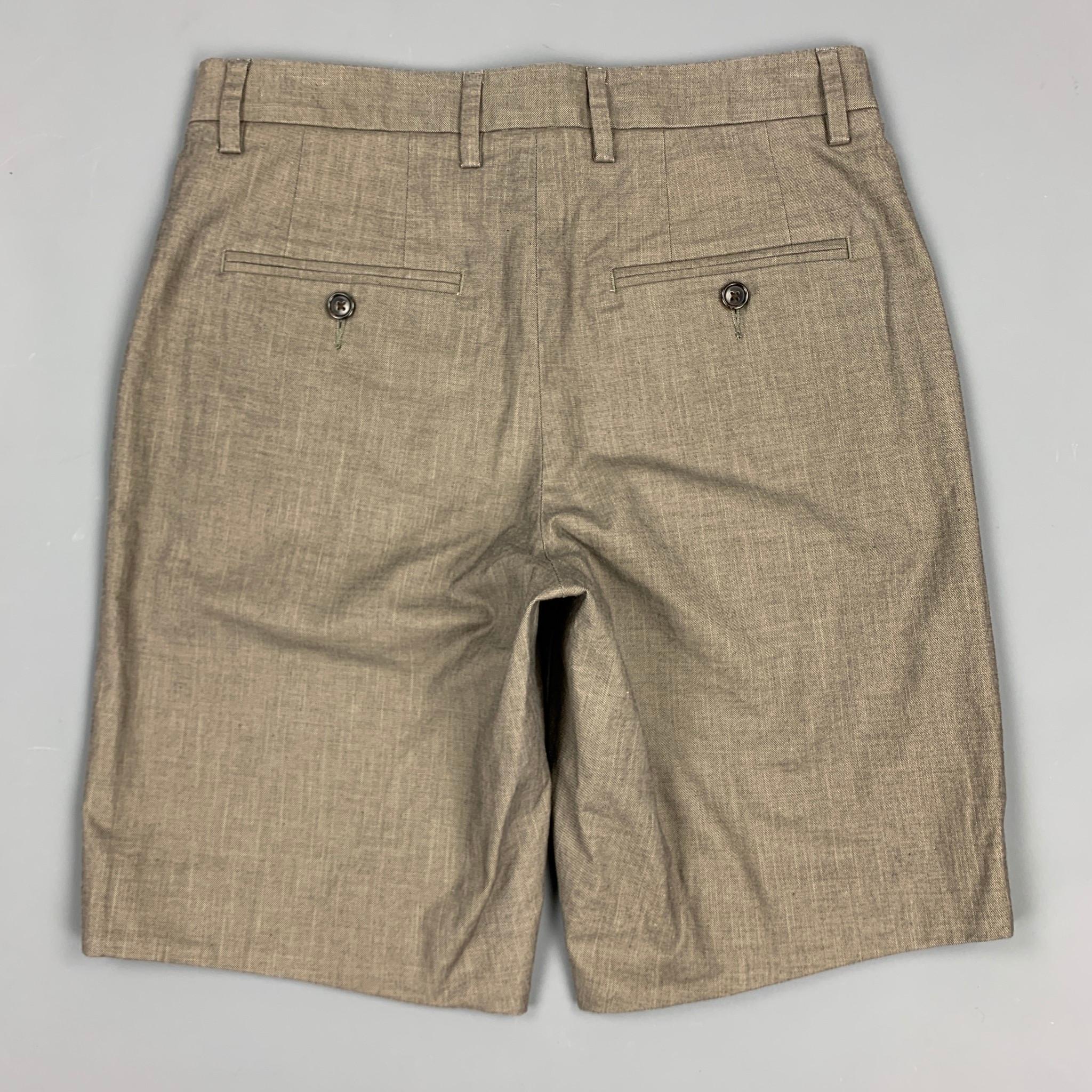 VINCE shorts comes in a slate cotton featuring a zip fly closure.

New With Tags.
Marked: 28

Measurements:

Waist: 30 in. 
Rise: 10 in. 
Inseam: 8.5 in. 