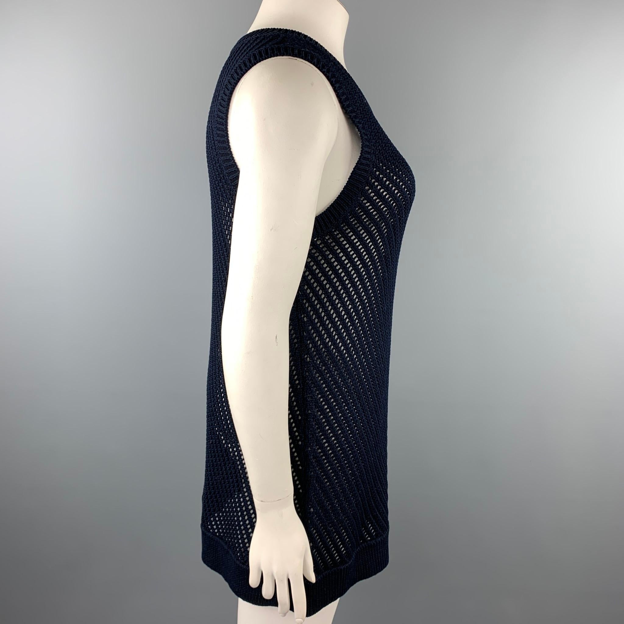 VINCE dress comes in a navy crochet cotton featuring a tunic style, sleeveless, and a crew-neck.

Very Good Pre-Owned Condition.
Marked: L

Measurements:

Shoulder: 14.5 in. 
Bust: 34 in. 
Hip: 38 in. 
Length: 30.5 in. 