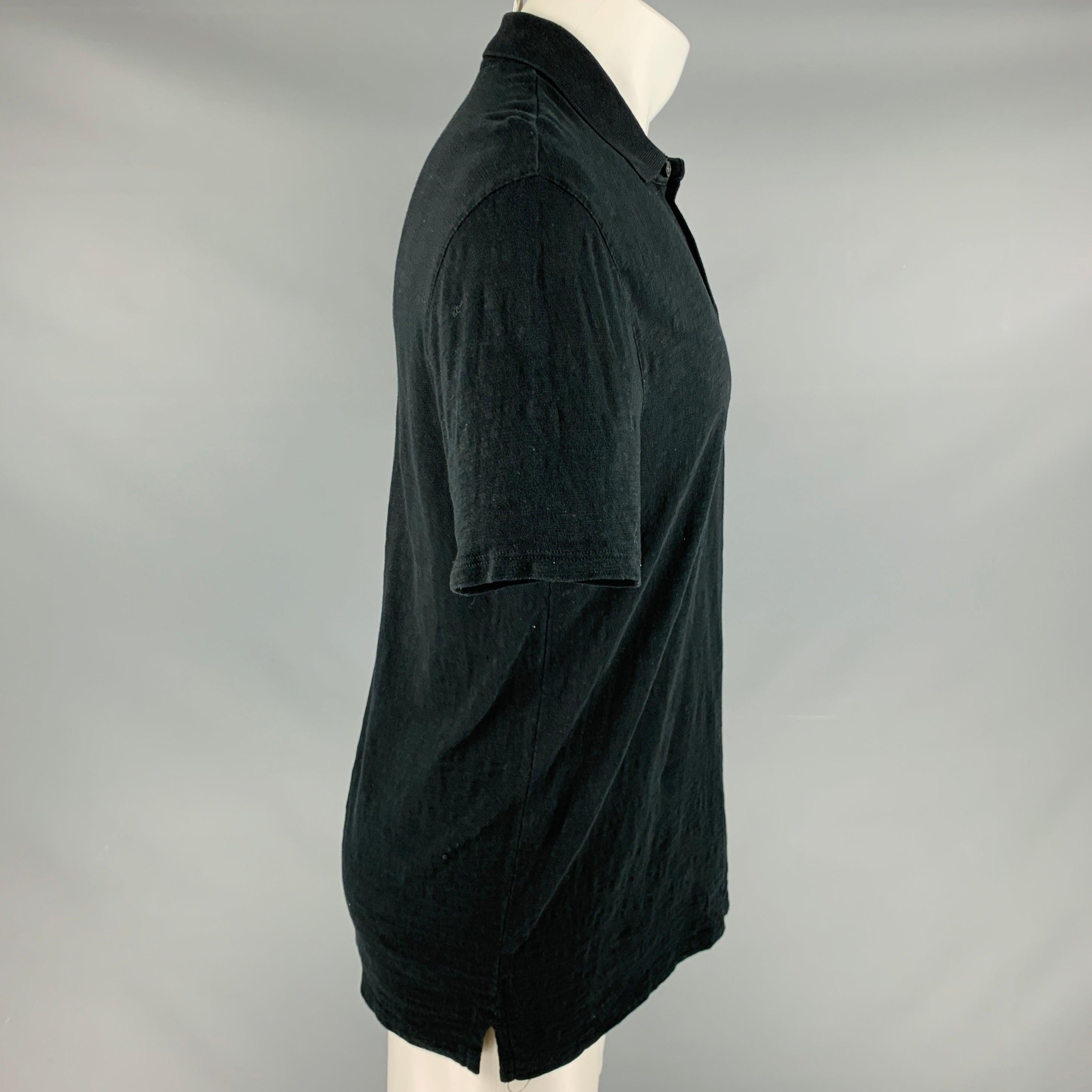 VINCE polo
in a black cotton knit featuring short sleeves and half placket button closure.Very Good Pre-Owned Condition. Minor mark on front. 

Marked:   M 

Measurements: 
 
Shoulder: 19.5 inches Chest: 39 inches Sleeve: 8.5 inches Length: 28