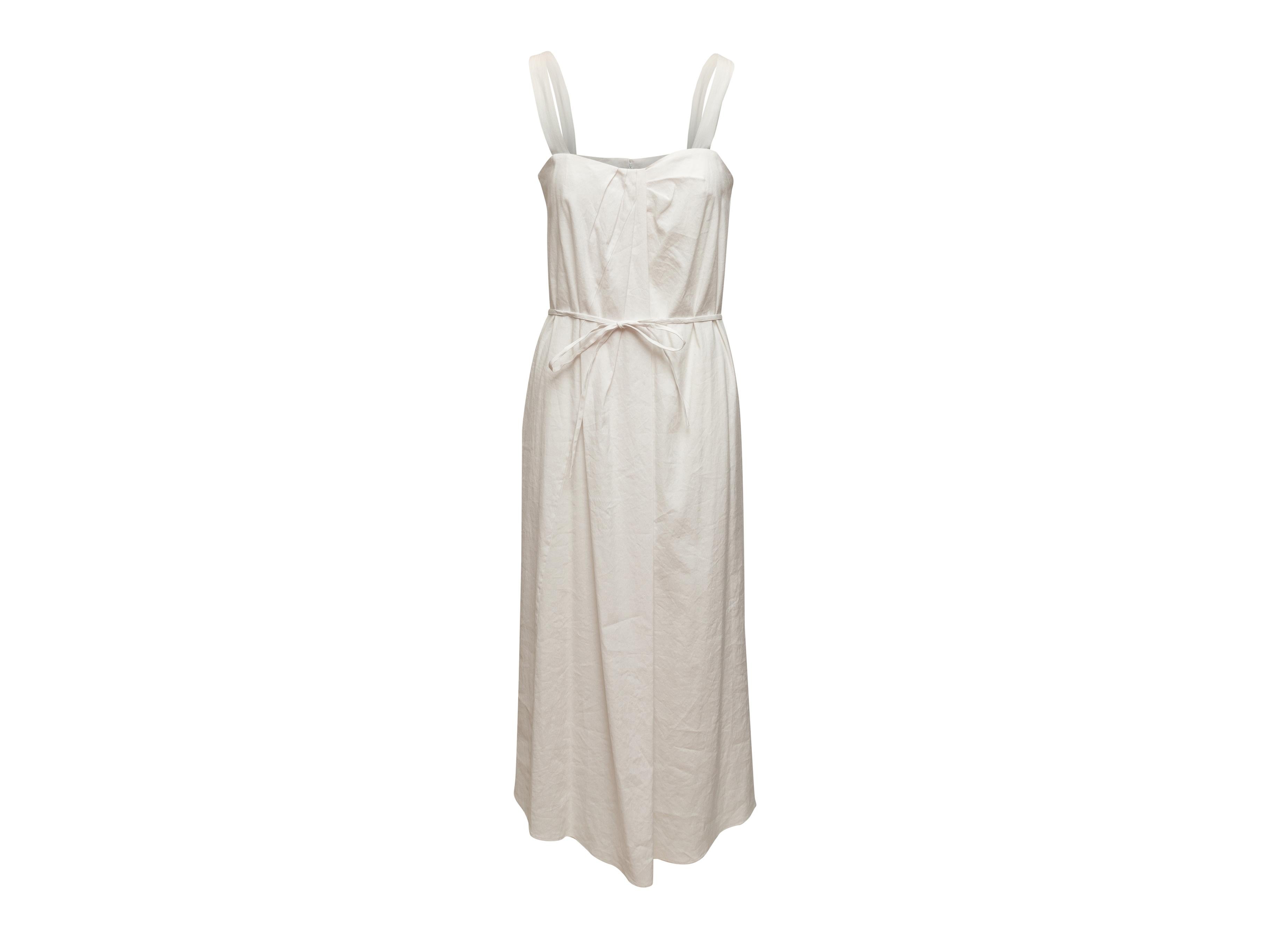Product details: White sleeveless maxi dress by Vince. Sweetheart neckline. Sash tie at waist. Zip closure at back. 34