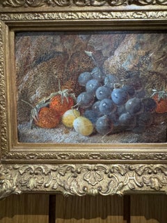 19th century English still life of fruit on a mossy bank landscape