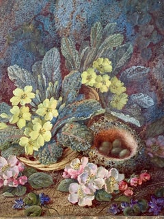 English Flowers and Birds nest with birds eggs on a mossy bank