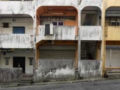 Borneo 2: photograph of urban city architecture with barber shop, Southeast Asia