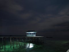 Borneo 5: stilt house architecture on the water at night, Southeast Asia