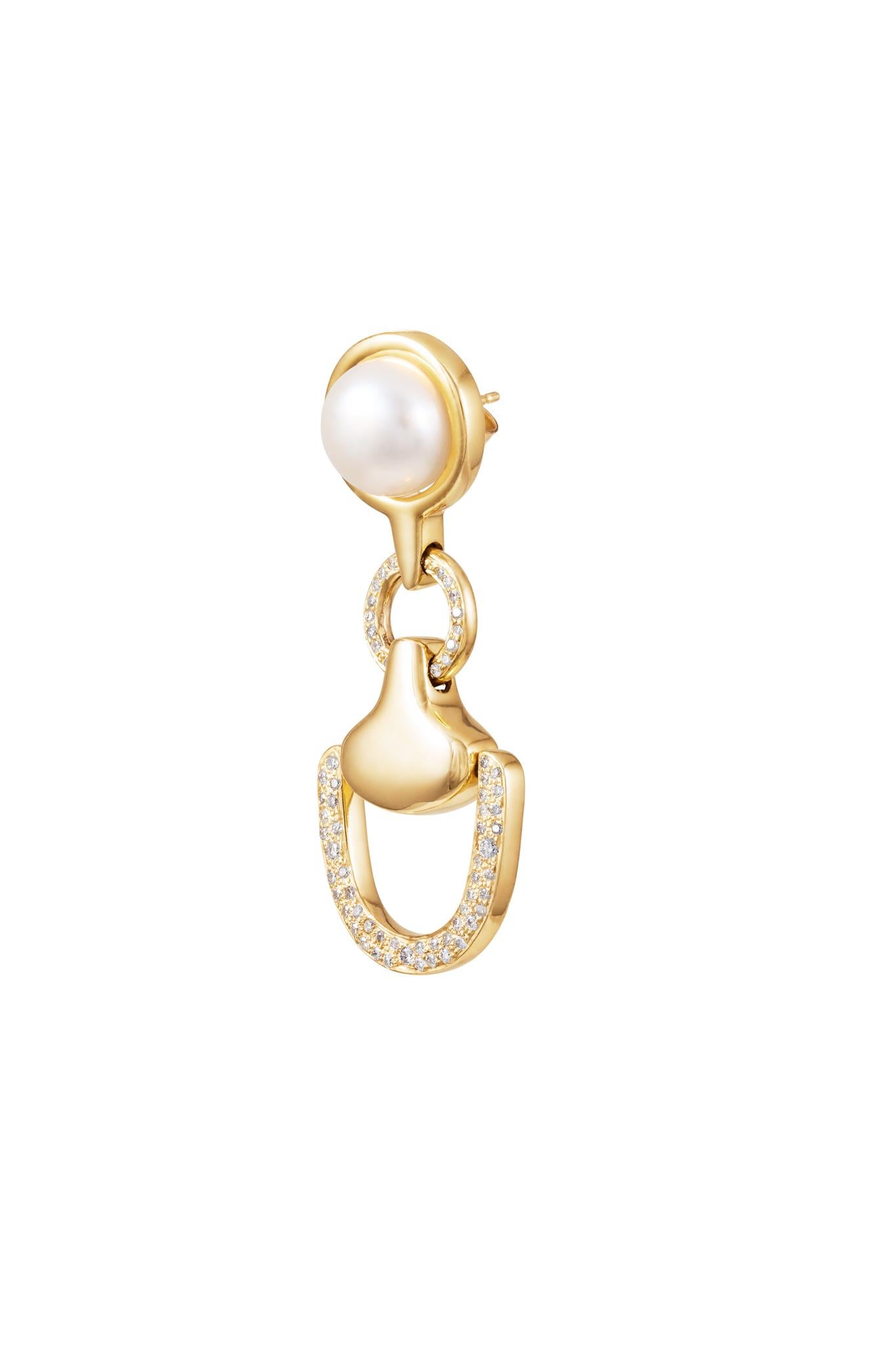 Part of the Vincent Peach Equestrian Collection, the Churchill Downs Earrings have a signature 14kt Yellow Gold Bit Drop design with 1.65ct Diamonds, a Freshwater Pearl, VP design on the back and a Gold Fill Post. These luxurious and chic earrings