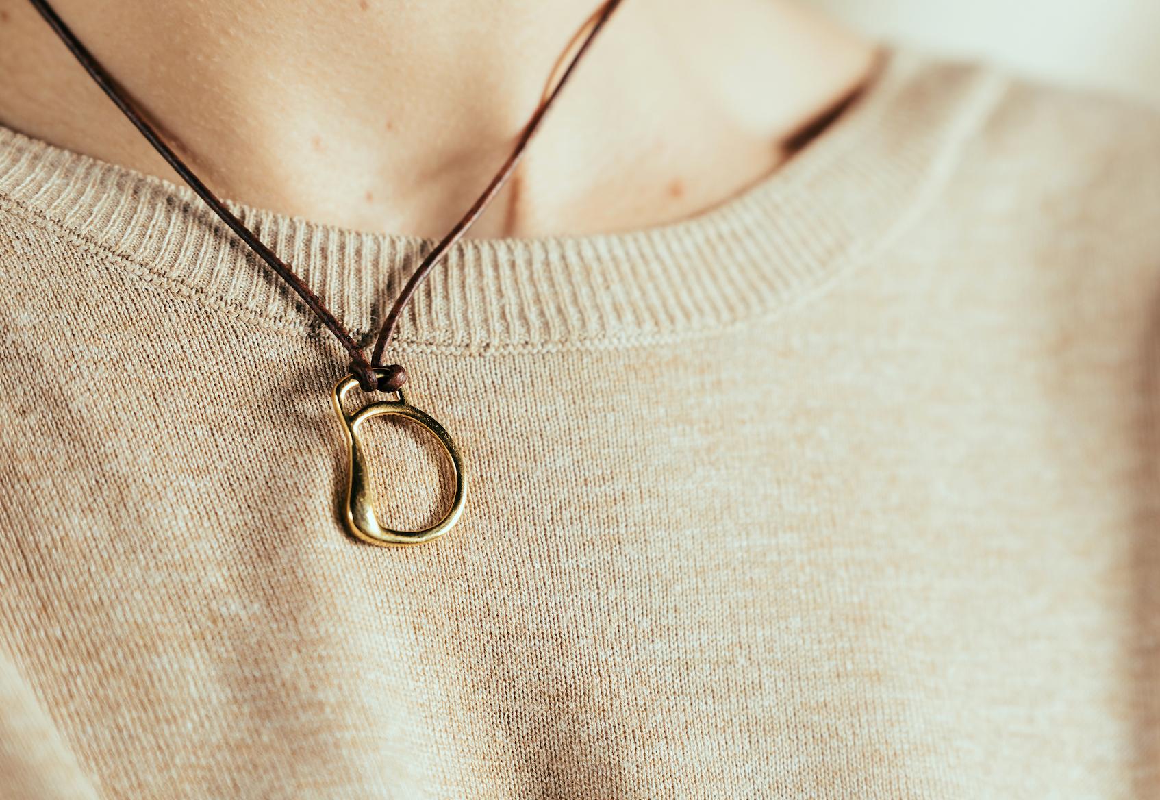 Part of the Vincent Peach Equestrian Collection, the Cheval Bit Necklace has a 14kt Yellow Gold Bit Design on a Premium Brown Leather Cord with a luxurious Tahitian Pearl Clasp. The Cheval Bit Necklace comes in the standard 17
