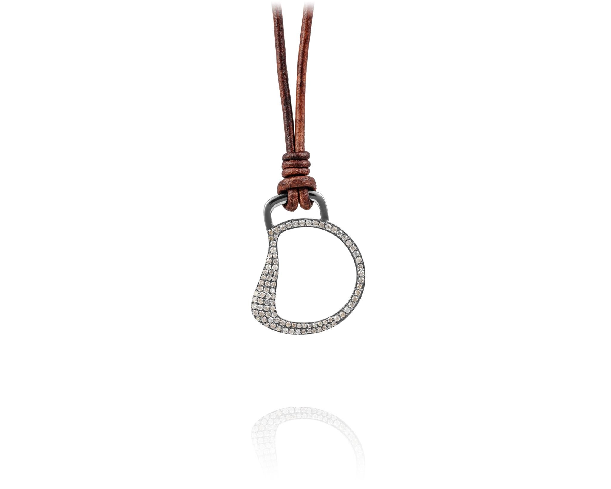 Part of the Vincent Peach Equestrian Collection, the Diamond Cheval Bit Necklace has .4ct Diamonds mounted in a Sterling Silver Bit Design on a Premium Brown Leather Cord with a luxurious Tahitian Pearl Clasp. The Cheval Bit Necklace comes in the