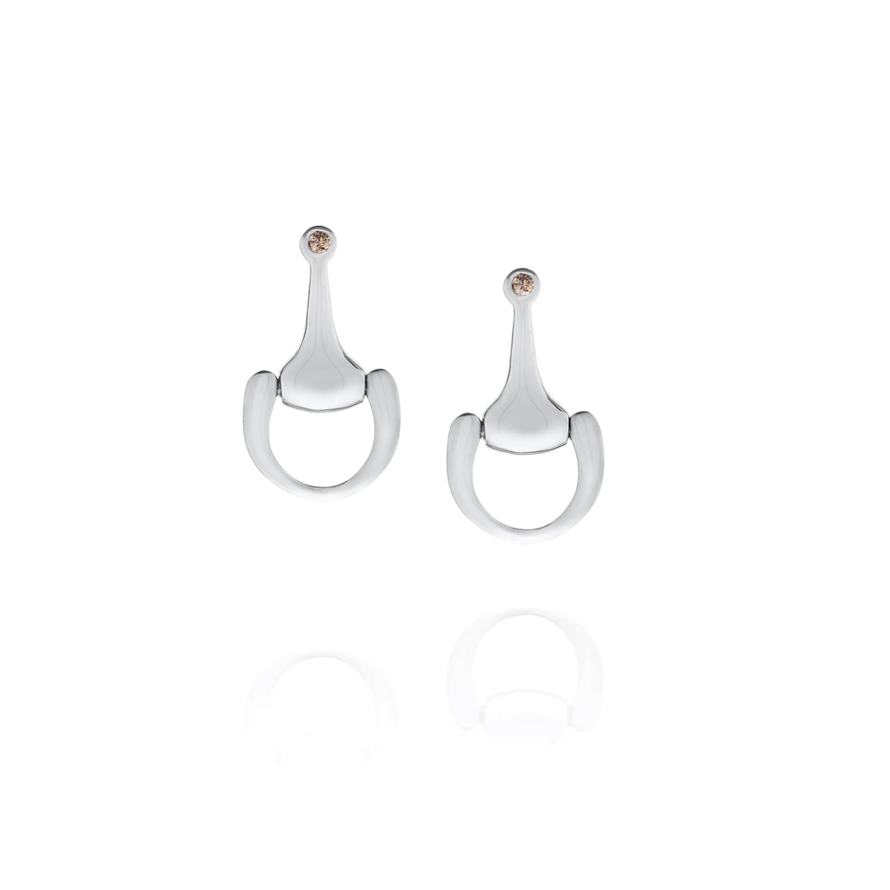 Part of the Vincent Peach Equestrian Collection, the Small Equestrian Bit Earrings have 14kt Yellow Gold stirrups covered in round, White Diamonds with a hinge to let the bottom move with you. These luxurious Equestrian Bit Earrings are 1