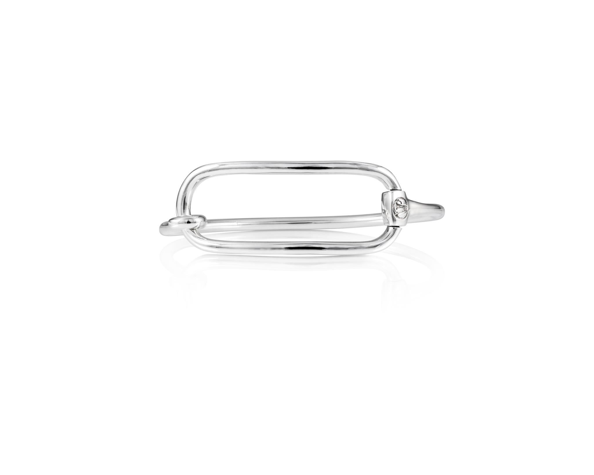 Part of the Vincent Peach Equestrian Collection, the chic Rectangle Snaffle Bit Bangle is solid Sterling Silver and is 7