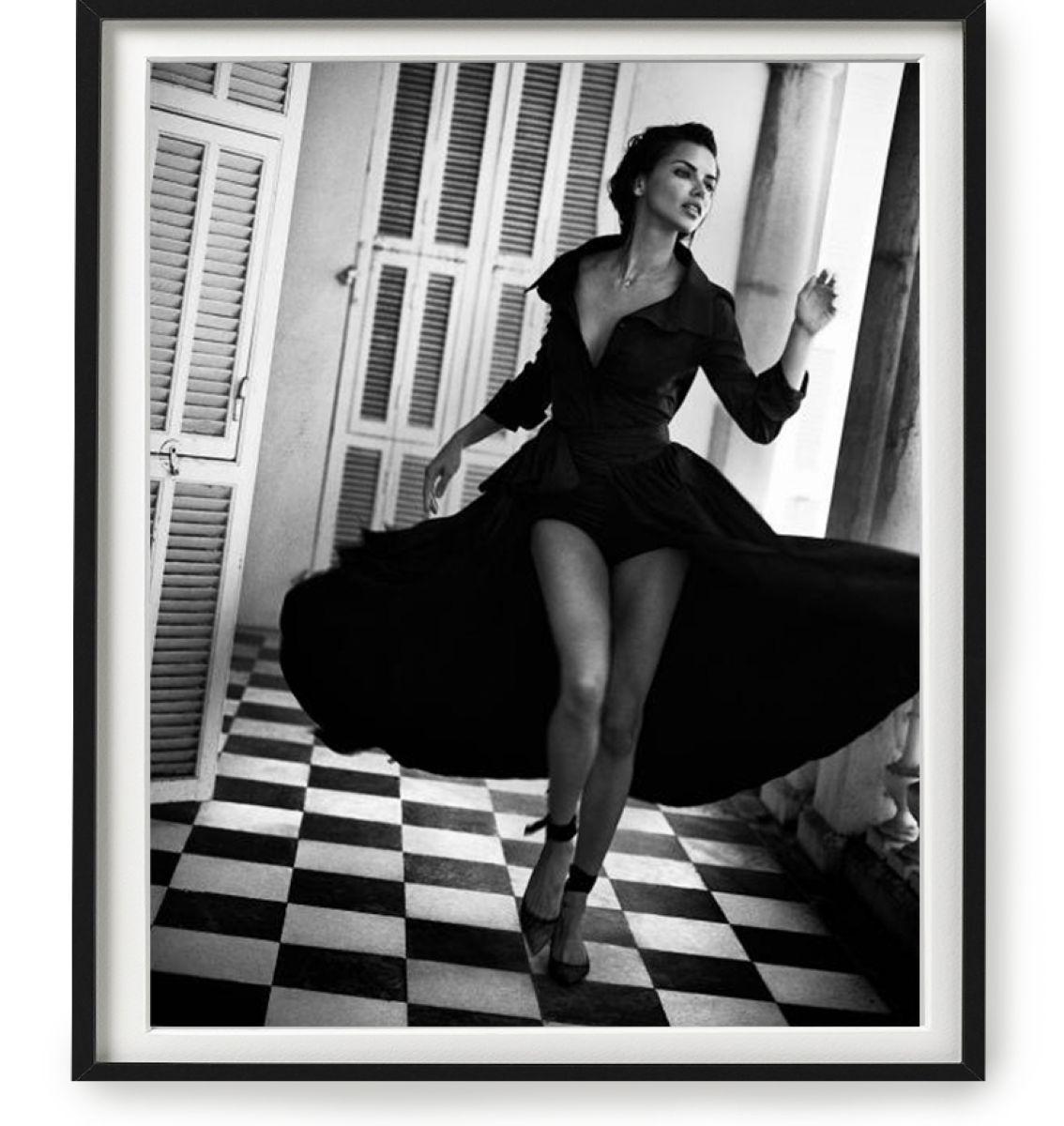Vincent Peters Portrait Photograph - Adriana Lima, Menton, 2017 - the Supermodel in a black dress running 