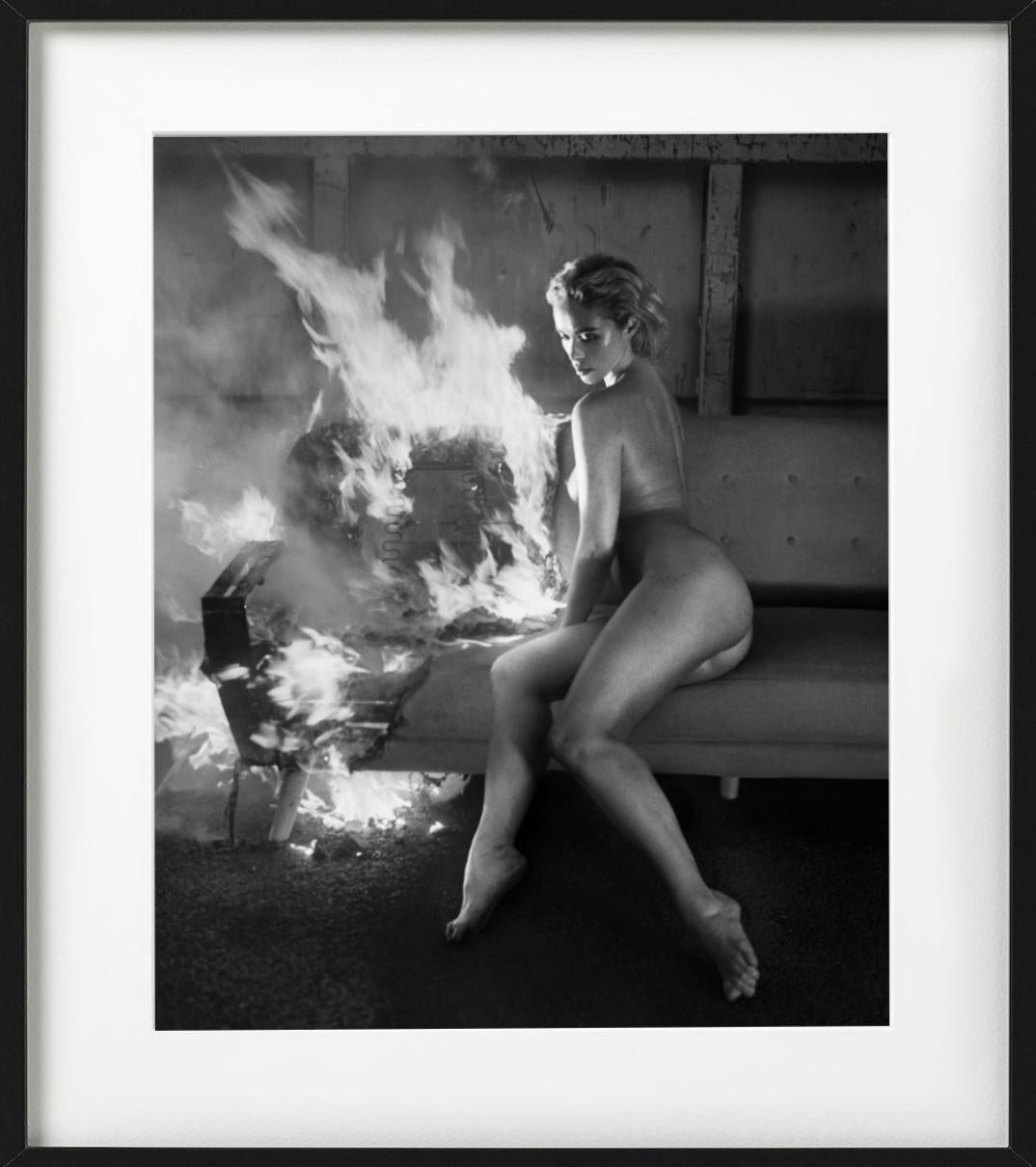 Victoria Fire for Playboy - b&w photograph nude model sitting on a burning sofa For Sale 1