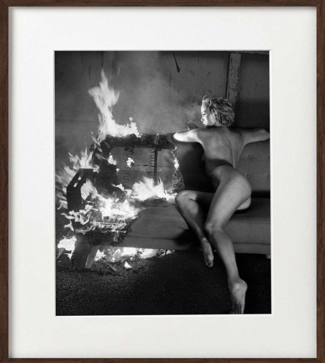 Victoria Fire for Playboy i- b&w photograph nude model sitting on a burning sofa For Sale 1