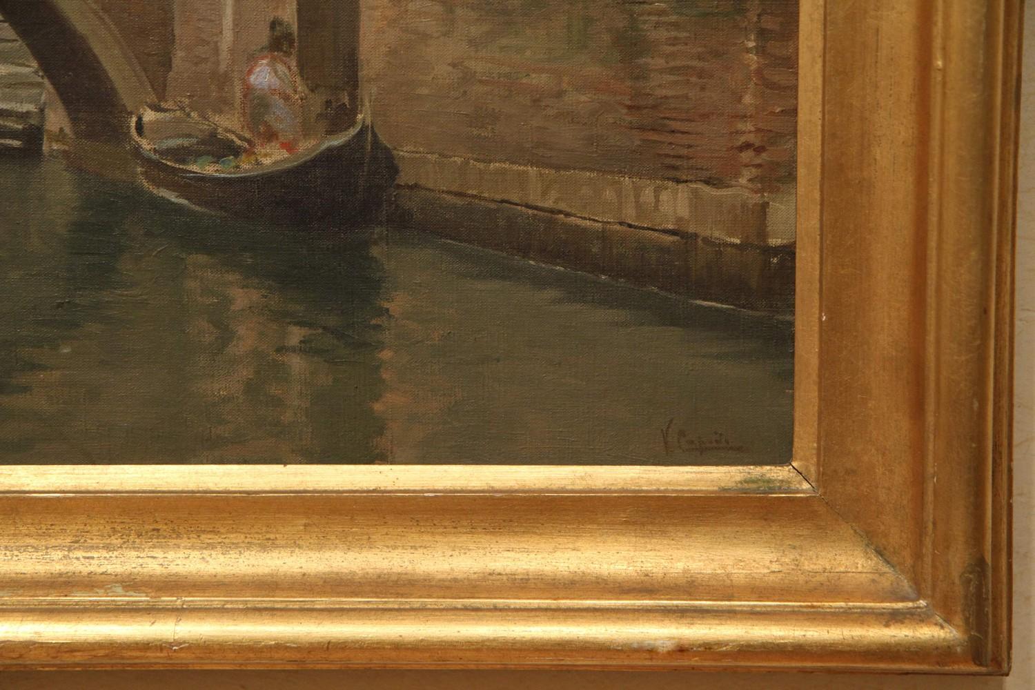 The present oil on canvas is a beautiful and charming example of Venetian view painting, the artist made it on the spot. Every day life is the topic of this composition: the typical Venetian boats called gondolas are moored near the entrances of the