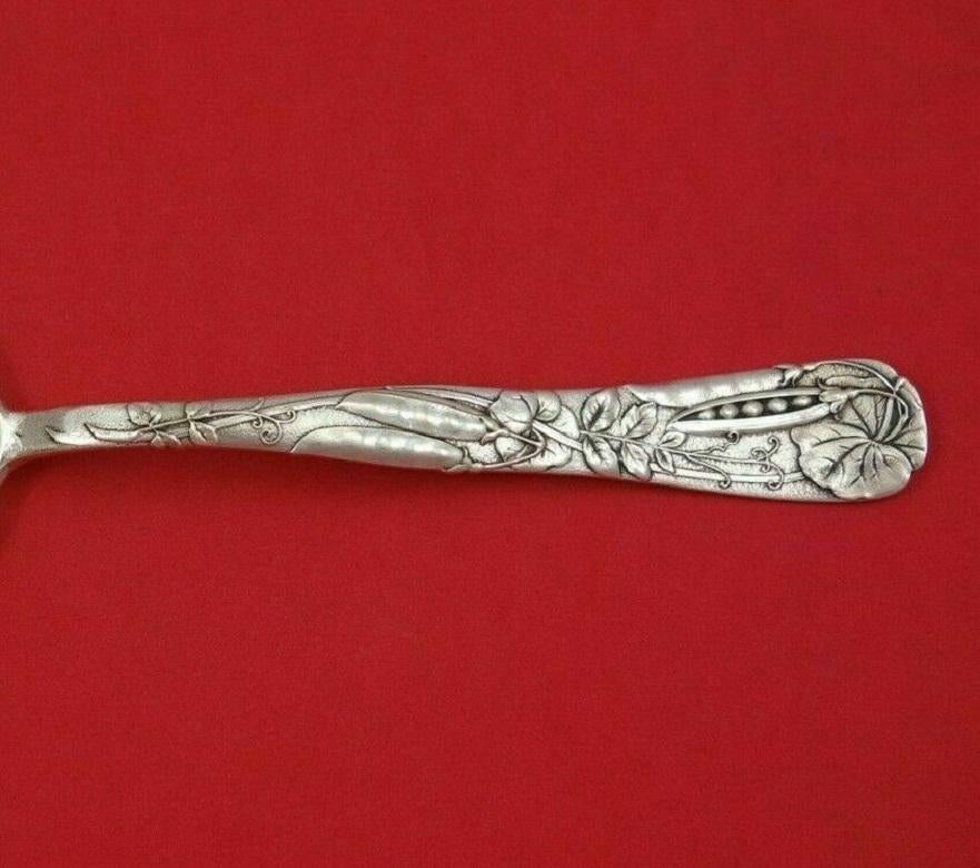 Sterling silver ice spoon with pea pods, 9 1/2