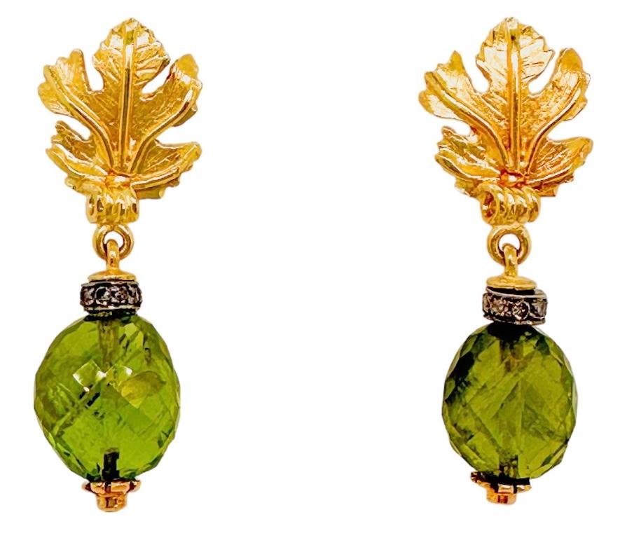 NEW drop earrings with small 18ct yellow gold Vine Leaf tops with peridot briolettes with diamond crowns.
