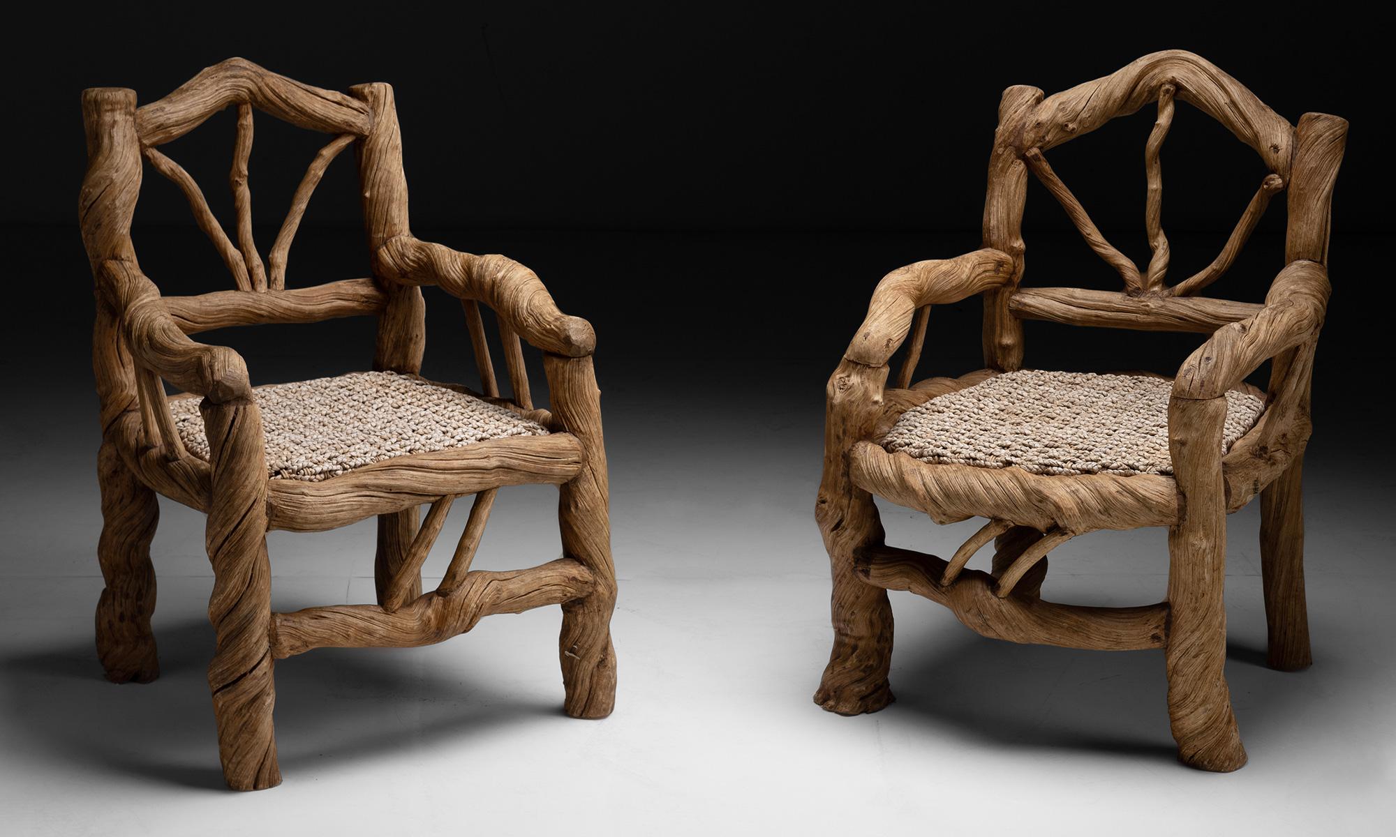 Vine wood armchairs

Asia, circa 1980

Constructed from massive Liana Vines.

Measures: 27”L x 26.5”d x 38.5”h x 17.5”seat.