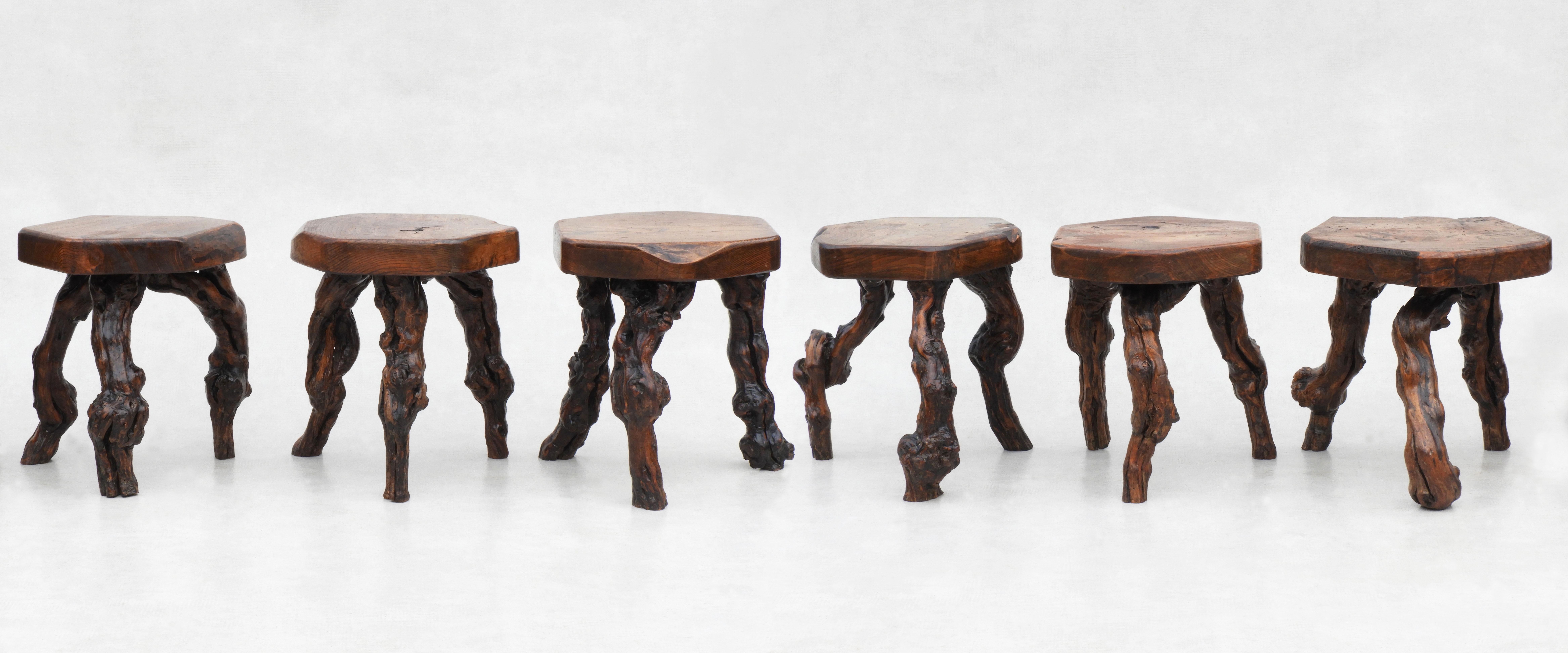 A fabulous set of grapevine tripod stools from c1950s France. Six French Brutalist style tabouret seats, each one individually handcrafted and totally unique. Organic form seating from the Bordeaux wine region of France with solid walnut tops and