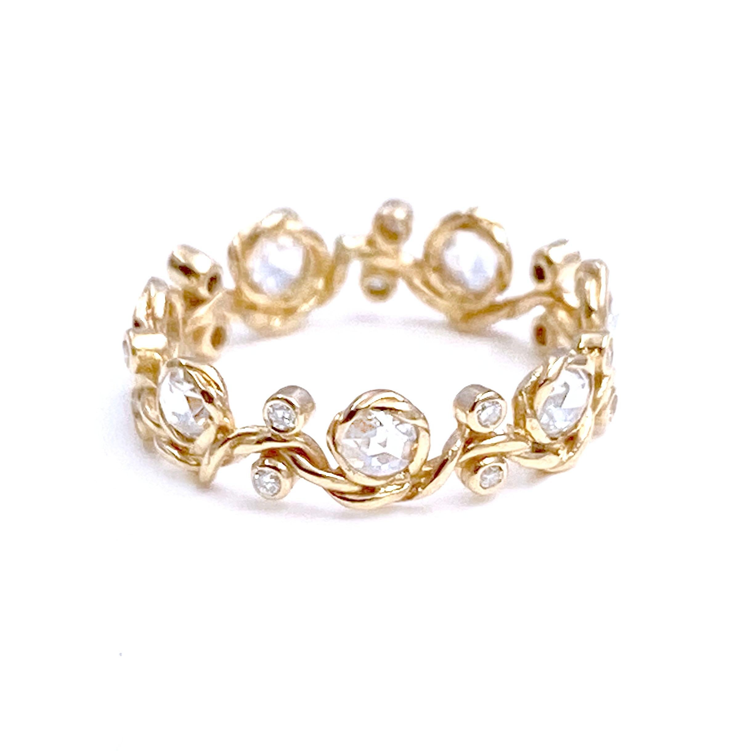 From JeweLyrie's Alternative Bridal collection, Vineyard rose-cut diamond eternity stackable gold crown ring features signature twist bezel set rose-cut and brilliant cut diamonds perching along the signature wavy twist ring. The dazzling elegant