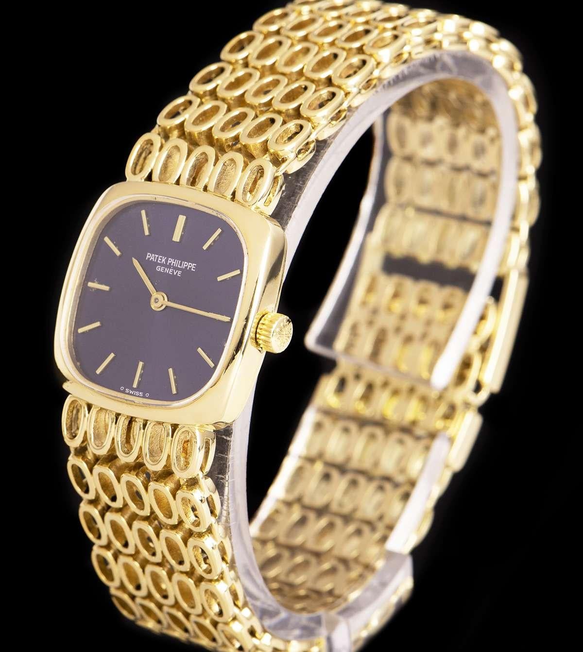 An 18k Yellow Gold Ellipse Vintage Ladies Wristwatch, blue dial with applied hour markers, a fixed 18k yellow gold bezel, an 18k yellow gold bracelet with an 18k yellow gold jewellery style clasp, sapphire glass, manual wind movement, in excellent