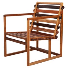 Vino Armchair made from various Brazilian woods. Showroom sample