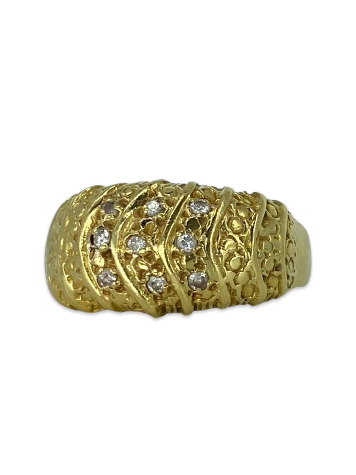 Vintage 0.10 Carat Diamonds Hammered Design Ring 18k Gold. The ring measures 10mm in height and features nine round diamonds for a total of 0.10tcw. The ring is a size 8 and weights 4.2g