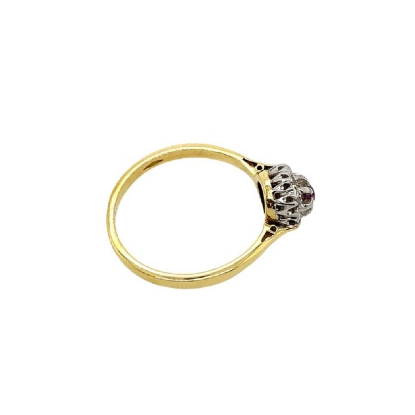 Vintage 0.10ct Ruby & 0.06ct Diamond Cluster Ring in 18ct White & Yellow Gold In Excellent Condition For Sale In London, GB