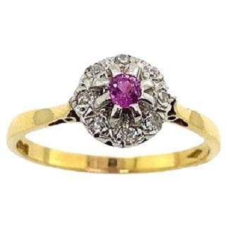 Vintage 0.10ct Ruby & 0.06ct Diamond Cluster Ring in 18ct White & Yellow Gold For Sale
