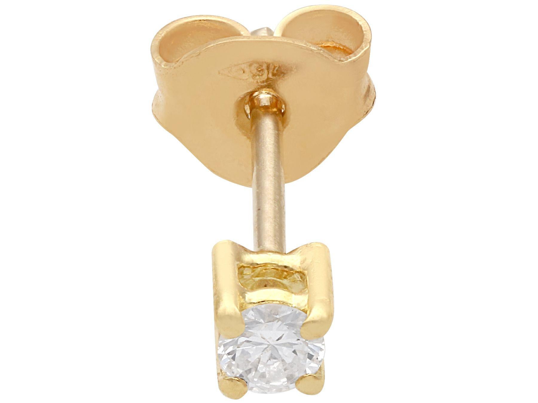 A fine and impressive pair of vintage 0.16 carat diamond and 18 karat yellow gold stud earrings; part of our diverse diamond jewellery collections

These fine and impressive diamond stud earrings have been crafted in 18k yellow gold.

The earrings