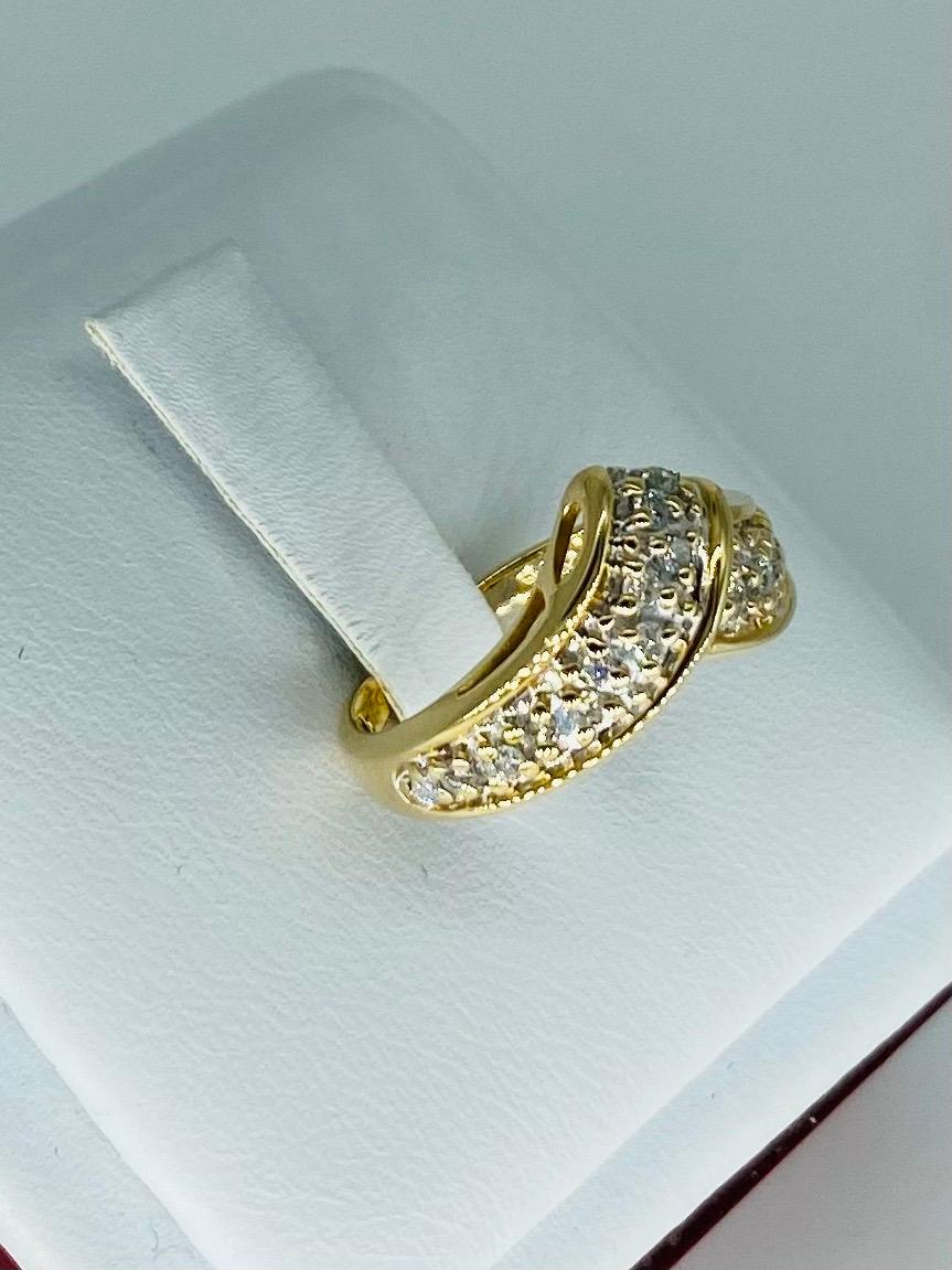 Vintage 0.25 Carat Diamond Tiara Ring 14k Gold 
circa 1970s
The ring features approx 0.25 carat of white diamonds and is crafted in 14k solid yellow gold. The ring is a size 5 and weights approx 3.6 grams of gold.