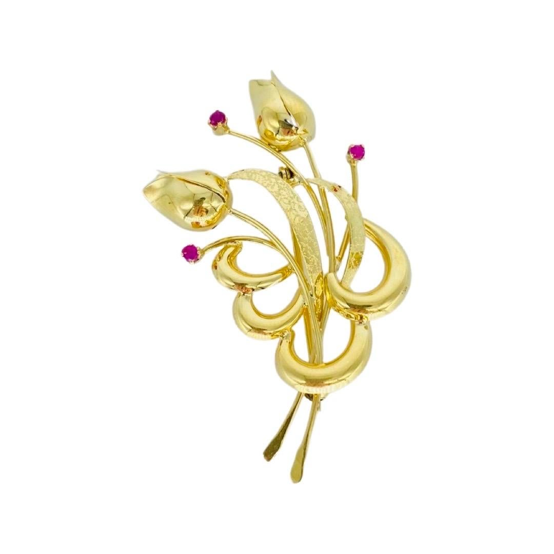 Vintage 0.25 Carat Ruby Gem Tulip Brooch Pin 18k Gold. Very elegant design of the Tulip flowers with Ruby gemstones makes this brooch very creative. The Ruby gemstones weight approx 0.25 carat. The brooch measures 2.5 Inch X 1.5 Inch and weights 7.2