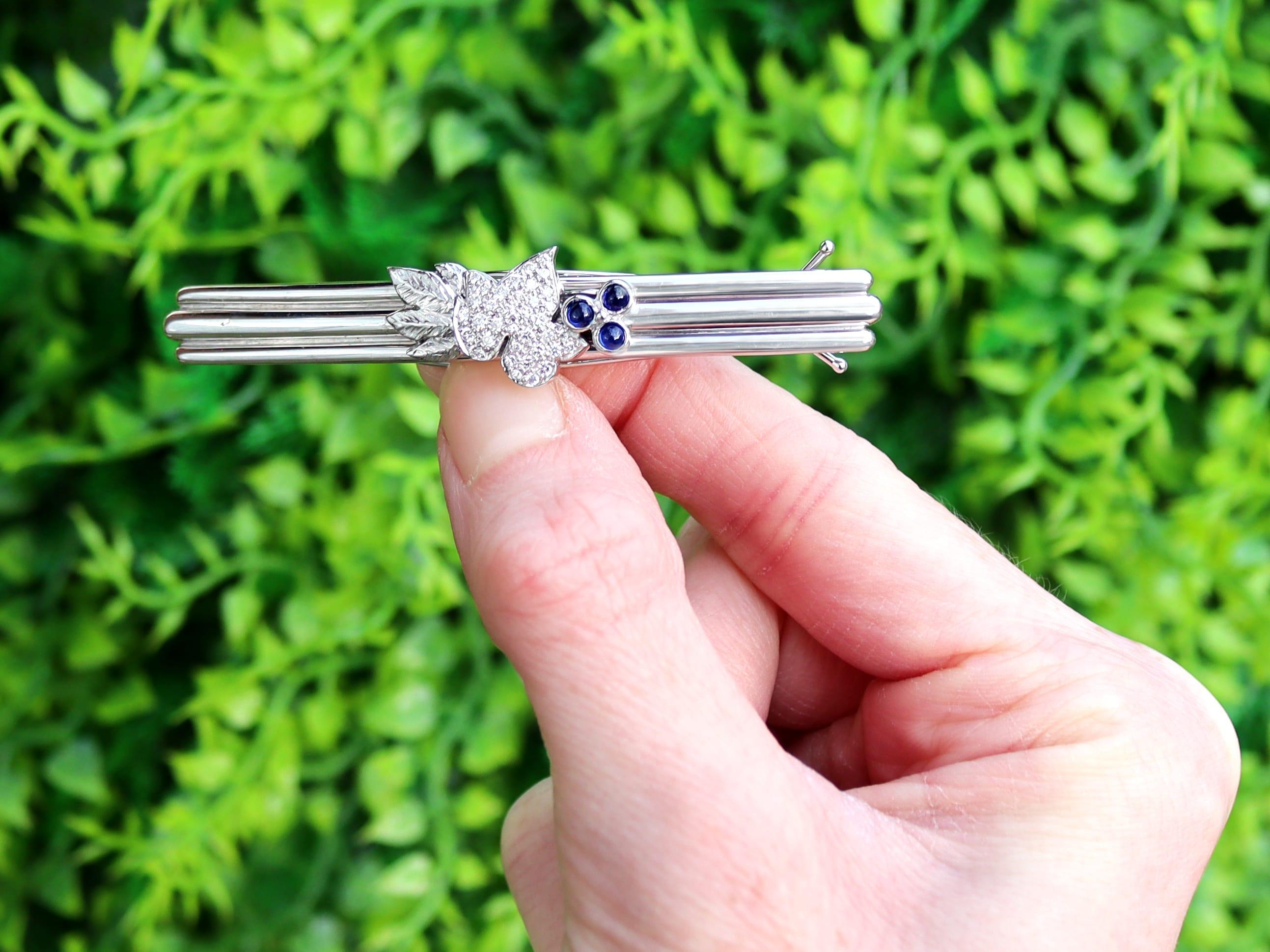 A fine and impressive vintage 0.28 carat sapphire and 0.34 carat diamond and 18 karat white gold hair clip; part of our diverse vintage sapphire jewelry collections.

This fine and impressive sapphire and diamond hair clip/barrette has been crafted