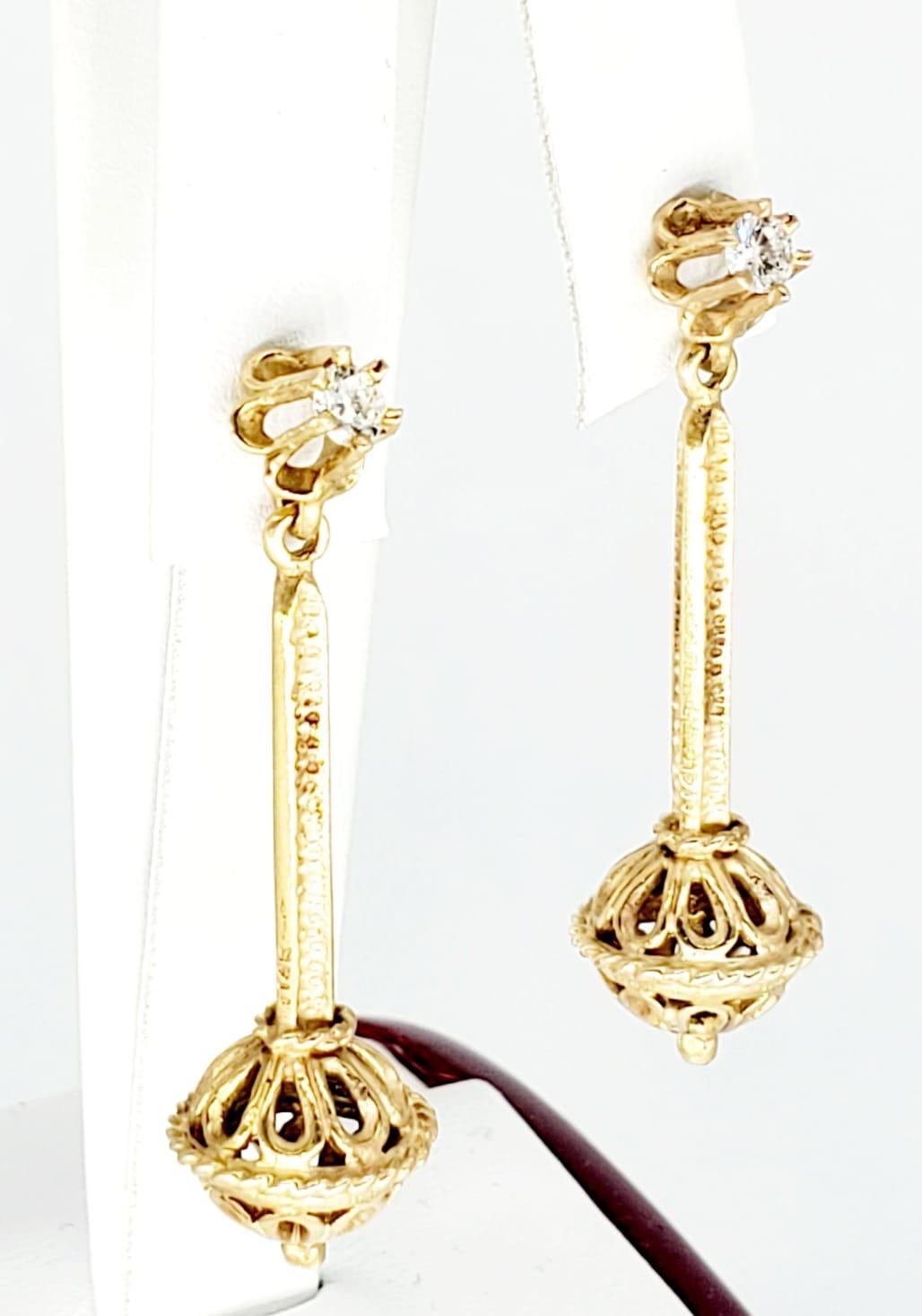 Vintage 0,30 Karat Diamant baumelnden 14k Ohrringe. Die Ohrringe sind beide mit einem Diamanten von 0,15 Karat in SI-Reinheit besetzt, insgesamt also 0,30 Karat. Die Diamanten sind sehr schön und glänzend schön gemeistert mit diesem ein von einer