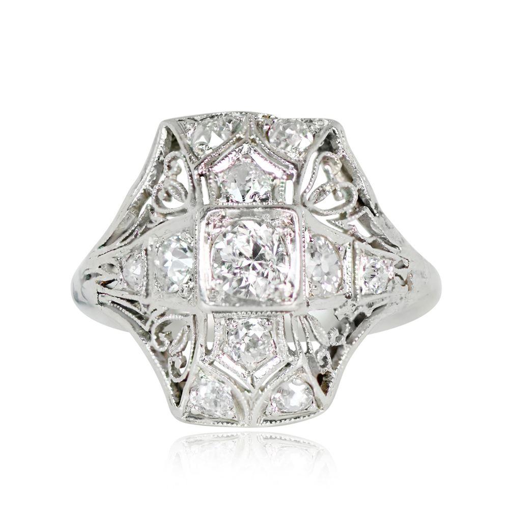 Art Deco Diamond Ring: Original design with a 0.30-carat H-color, Si1 clarity old European cut diamond. Intricate open-work and filigree details with additional old European cut diamonds. Handcrafted in platinum around 1925.


Ring Size: 6.5 US,
