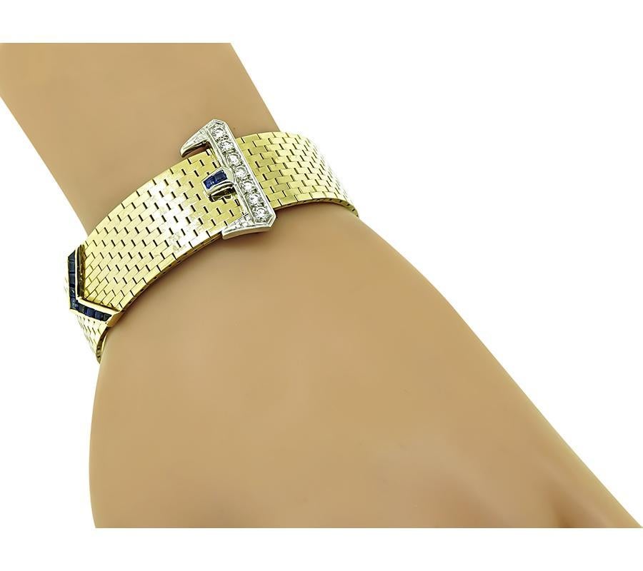 This is a gorgeous 14k yellow and white gold belt buckle bracelet from the 1950s. The bracelet is set with sparkling round cut diamonds that weigh approximately 0.40ct. The color of these diamonds is H with VS clarity. The diamonds are accentuated