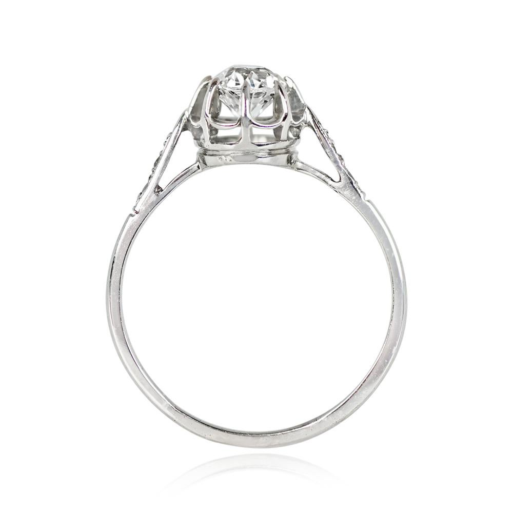 Vintage Retro Era Diamond Ring: Centered with an old mine-cut diamond weighing 0.40 carats, H color, VS1 clarity, set in box prongs. Single-cut diamond accents on each shoulder. Handcrafted in 14k white gold, circa 1940.

Ring Size: 6.5 US,