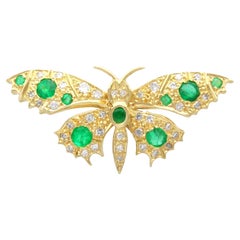 Vintage 0.45 Carat Emerald 0.43 Carat Diamond 18k Yellow Gold Butterfly Brooch
