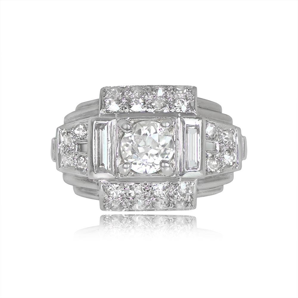 This exquisite French Retro era ring boasts an old European cut diamond, approximately 0.45 carats in weight, with H color and VS2 clarity. The center diamond is elegantly set within prongs inside a square bezel. The ring is further adorned with 24