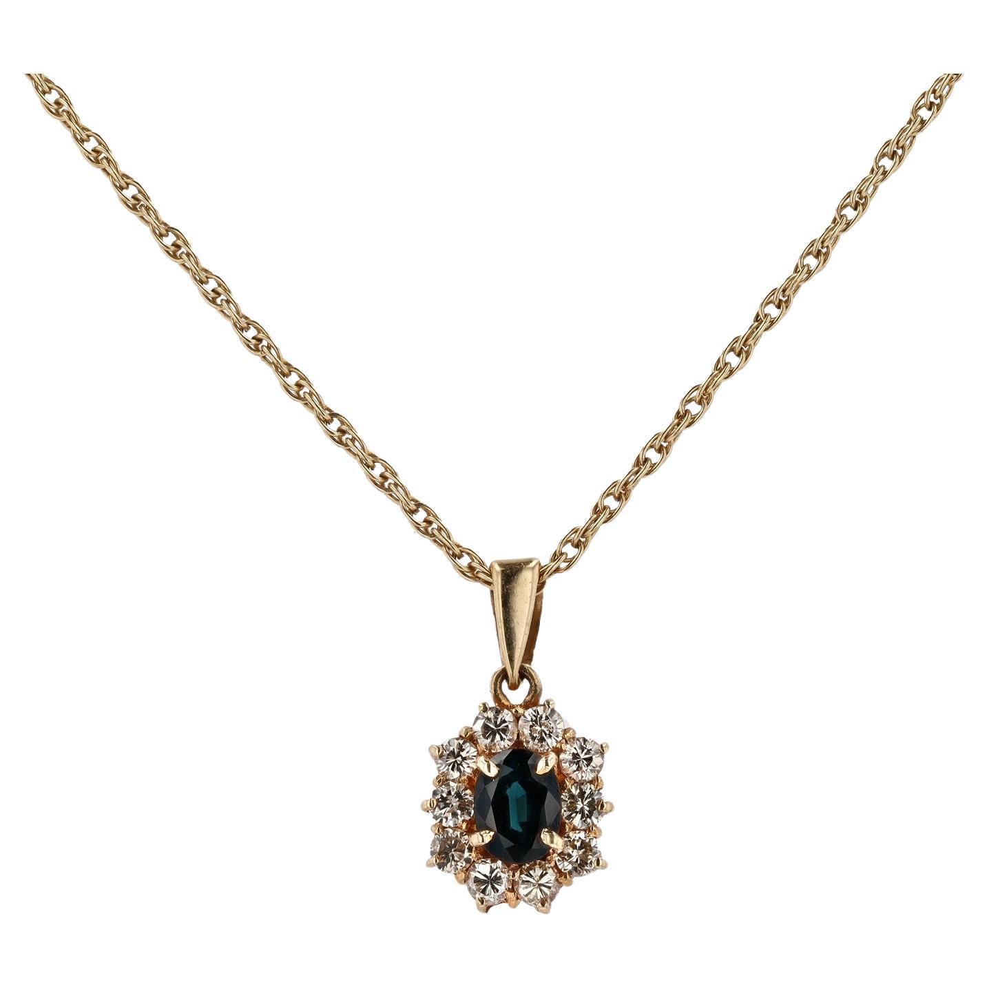 Vintage 0.48 Carat Blue Sapphire and Diamond Halo Necklace For Sale