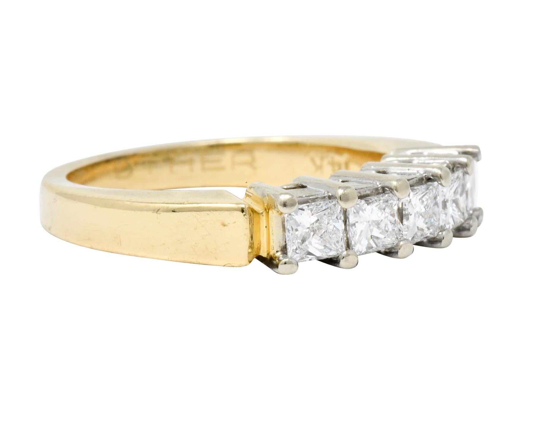 Band style ring set to front with five square cut diamonds weighing in total 0.50 carat; G/H color with VS to SI clarity

Basket set in white gold with a polished yellow gold shank

Tested as 14 karat gold

Circa: 1960s

Ring Size: 5 &