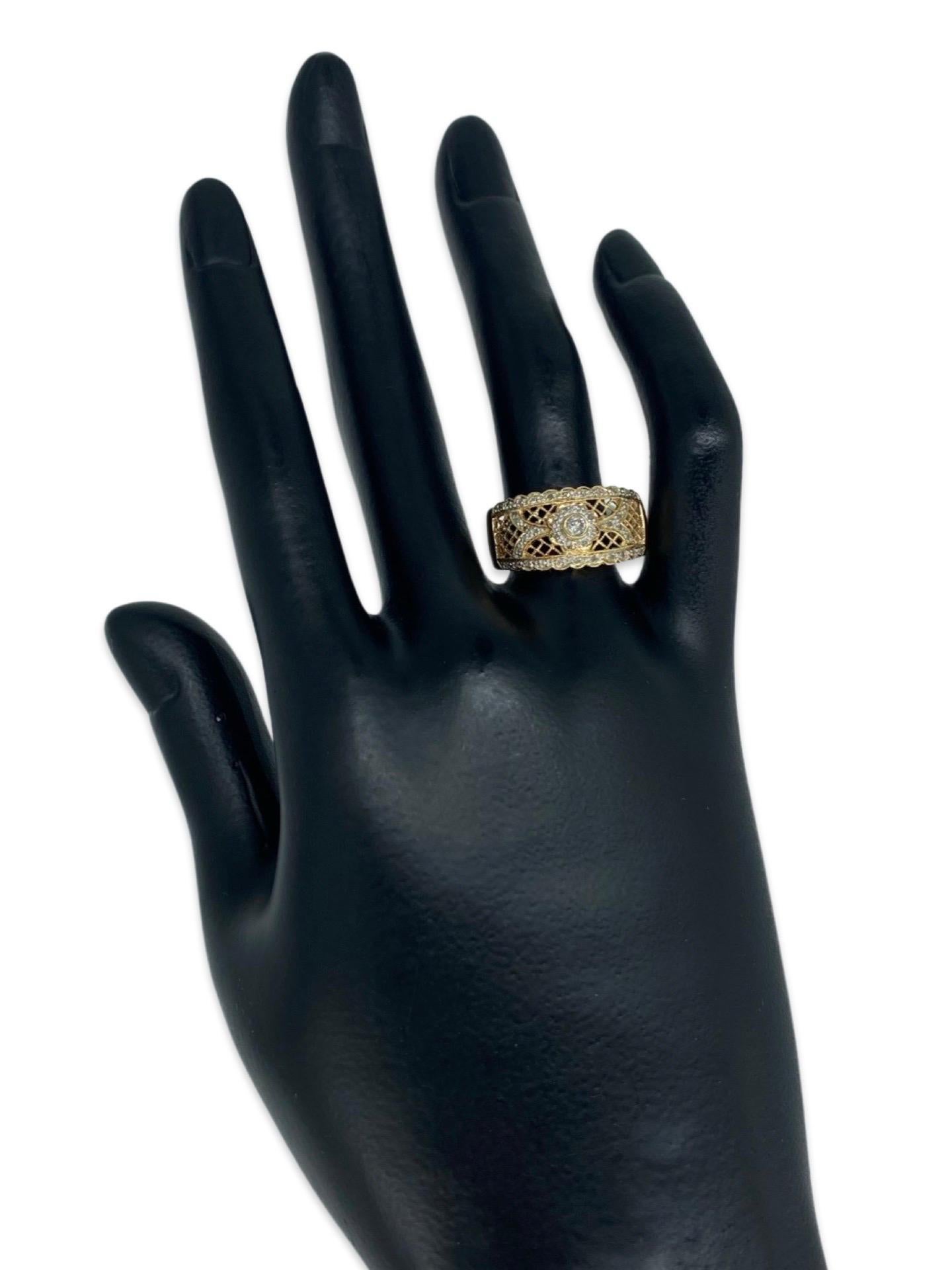 Vintage 0.50 Carat Diamonds Wide Band Ring 14k Gold. La bague mesure 10,30 mm de hauteur et correspond à une taille 8. Elle pèse 3,6 g et est fabriquée en or massif 14 carats au Mexique.