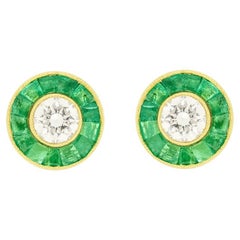 Orecchini d
epoca con diamanti e smeraldi da 0,50 ct, anni
80 ca.