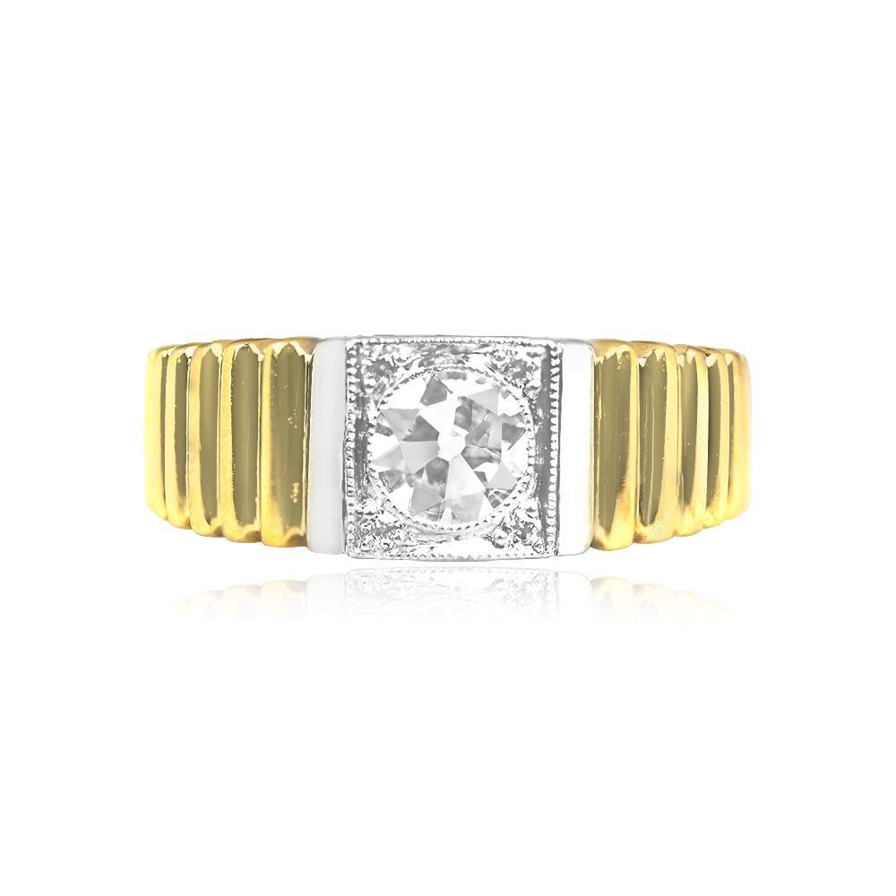 A vintage ring showcasing a 0.50-carat old European cut diamond at its center, elegantly bezel-set within a platinum box. The center stone is beautifully accented by four smaller diamonds, prong-set in the corners of the platinum box, with a total