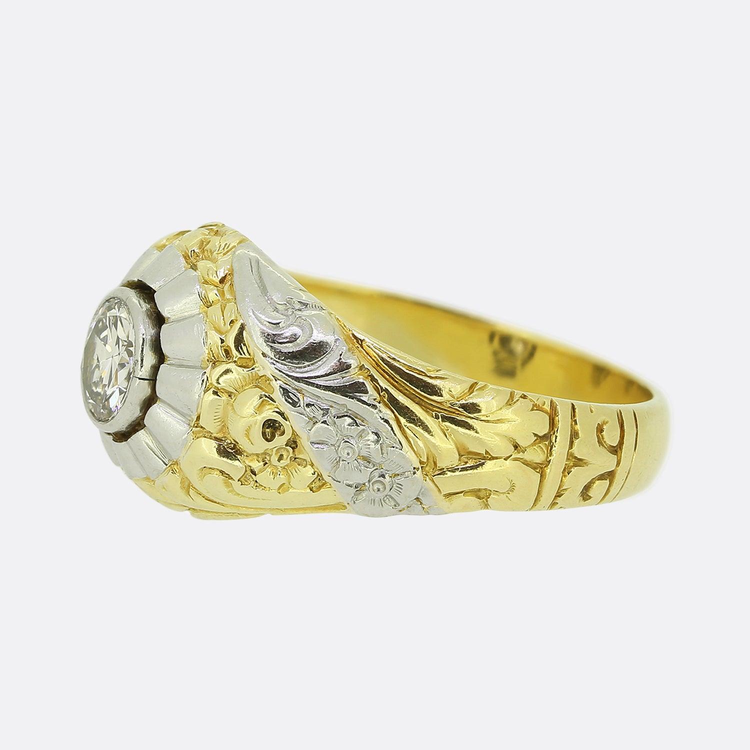 Here we have a wonderfully crafted single stone ring dating back to the 1940s. At the centre of the face we find a round brilliant cut diamond in a rub-over setting. However, this heavy piece gains its real character, firstly, from a ballerina like